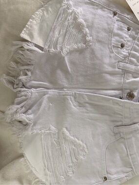 High-Rise White Distressed Denim Shorts